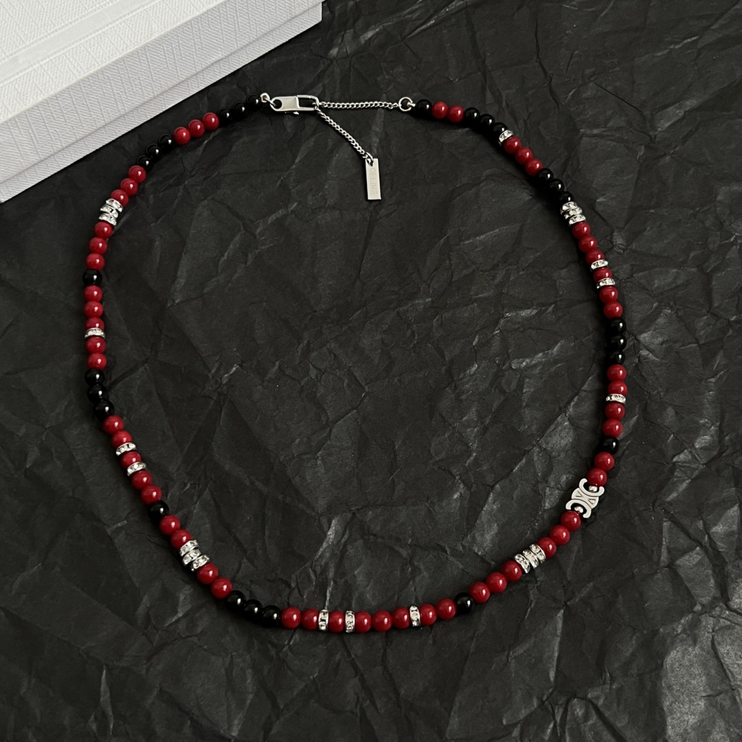 Celine Triomphe Beaded Necklace necklace Silver-toned metal with red and black beads accented with clear crystal rhinestones 45cm with 5cm extender chain
