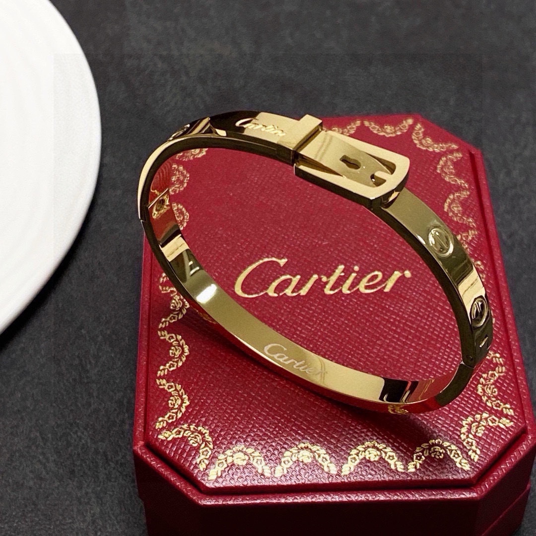 Cartier Buckle Motif Love Bangle bracelet Polished yellow gold-tone metal polished silver-tone metal no gemstones 17cm inner circumference