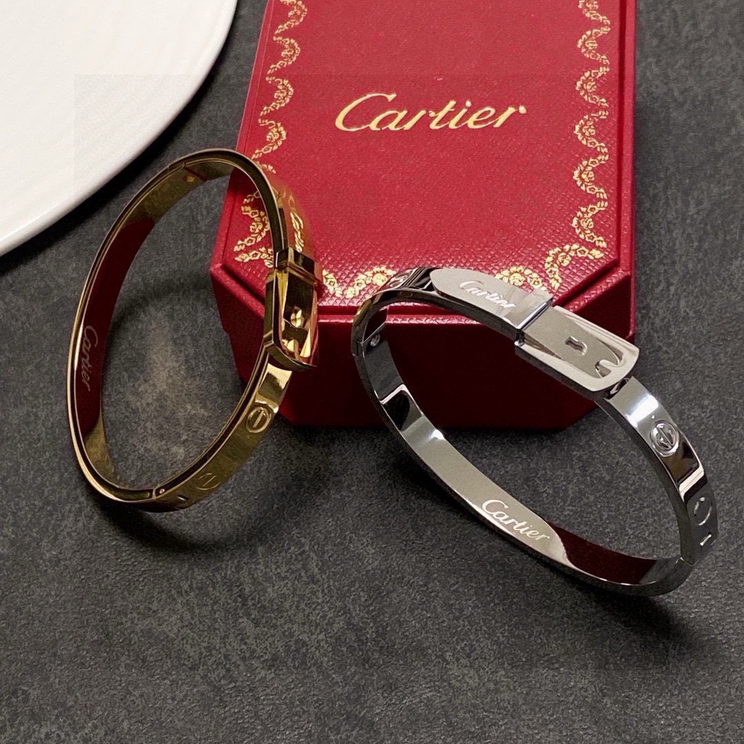 Cartier Buckle Motif Love Bangle bracelet Polished yellow gold-tone metal polished silver-tone metal no gemstones 17cm inner circumference