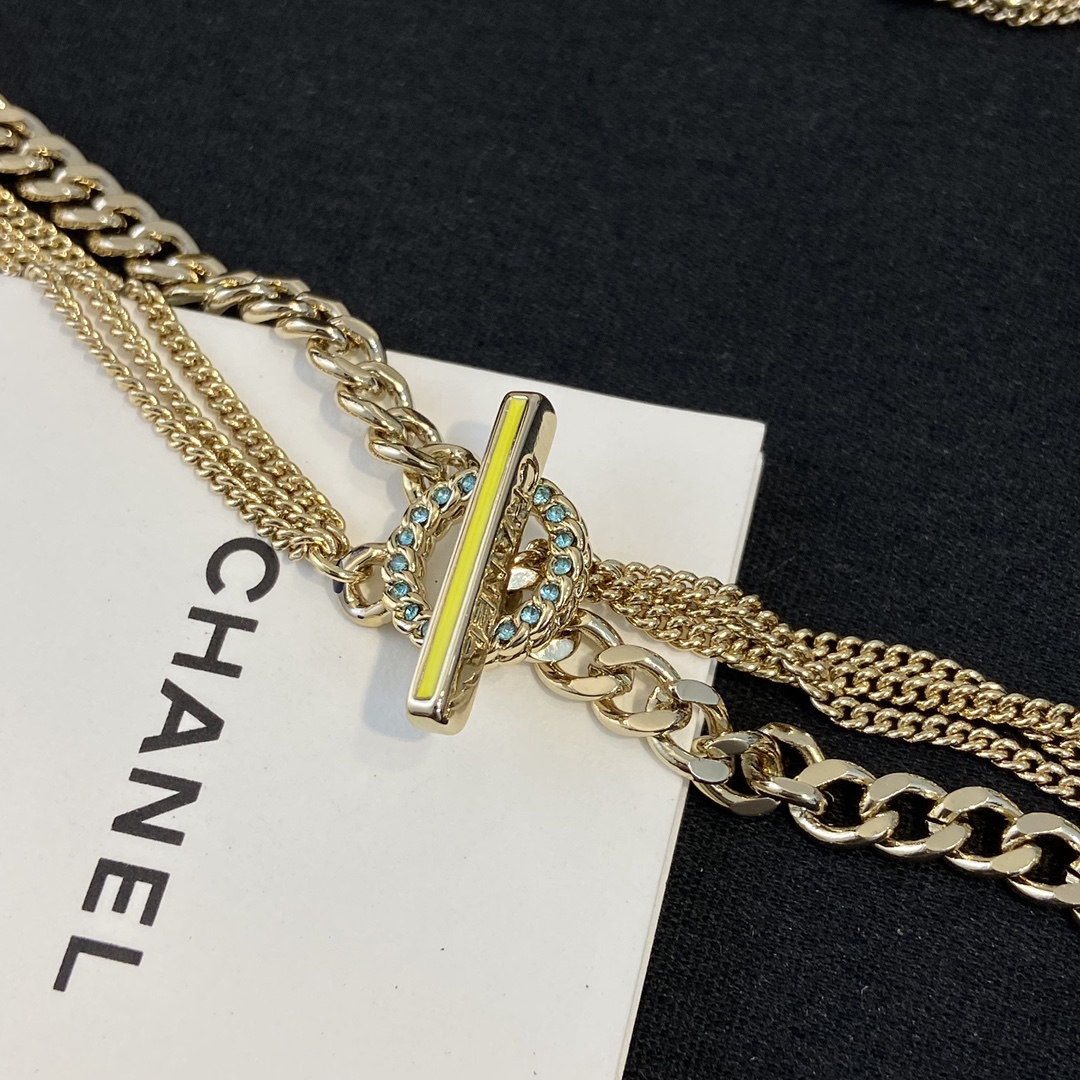 Chanel CHANEL Letter CC Logo Layered Necklace necklace Gold-tone metal with white pink yellow red enamel white faux pearls light blue crystal accents 42cm