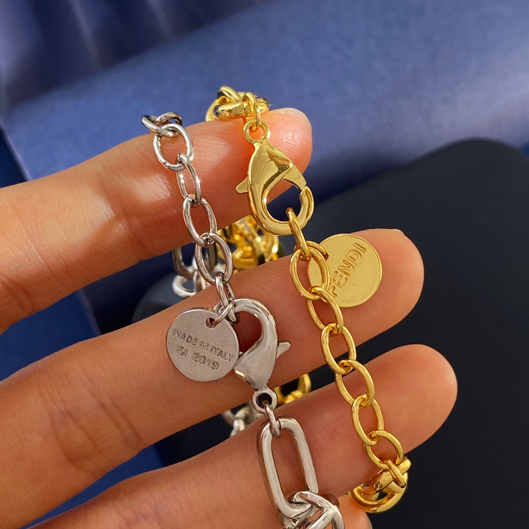 Fendi EverRound F Is Fendi bracelet gold-tone metal with clear crystal accents silver-tone metal with clear crystal accents adjustable 16-20cm