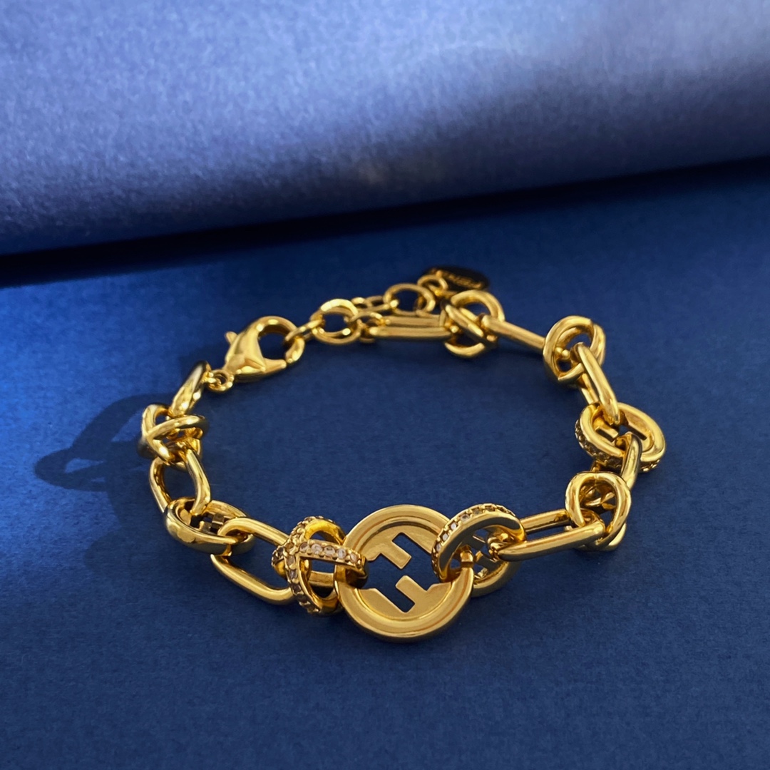 Fendi EverRound F Is Fendi bracelet gold-tone metal with clear crystal accents silver-tone metal with clear crystal accents adjustable 16-20cm