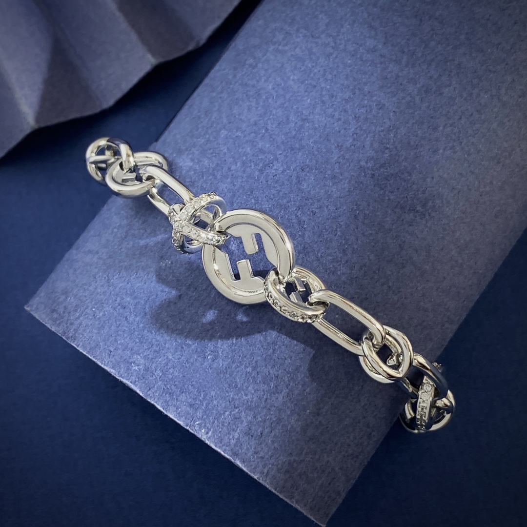Fendi EverRound F Is Fendi bracelet gold-tone metal with clear crystal accents silver-tone metal with clear crystal accents adjustable 16-20cm