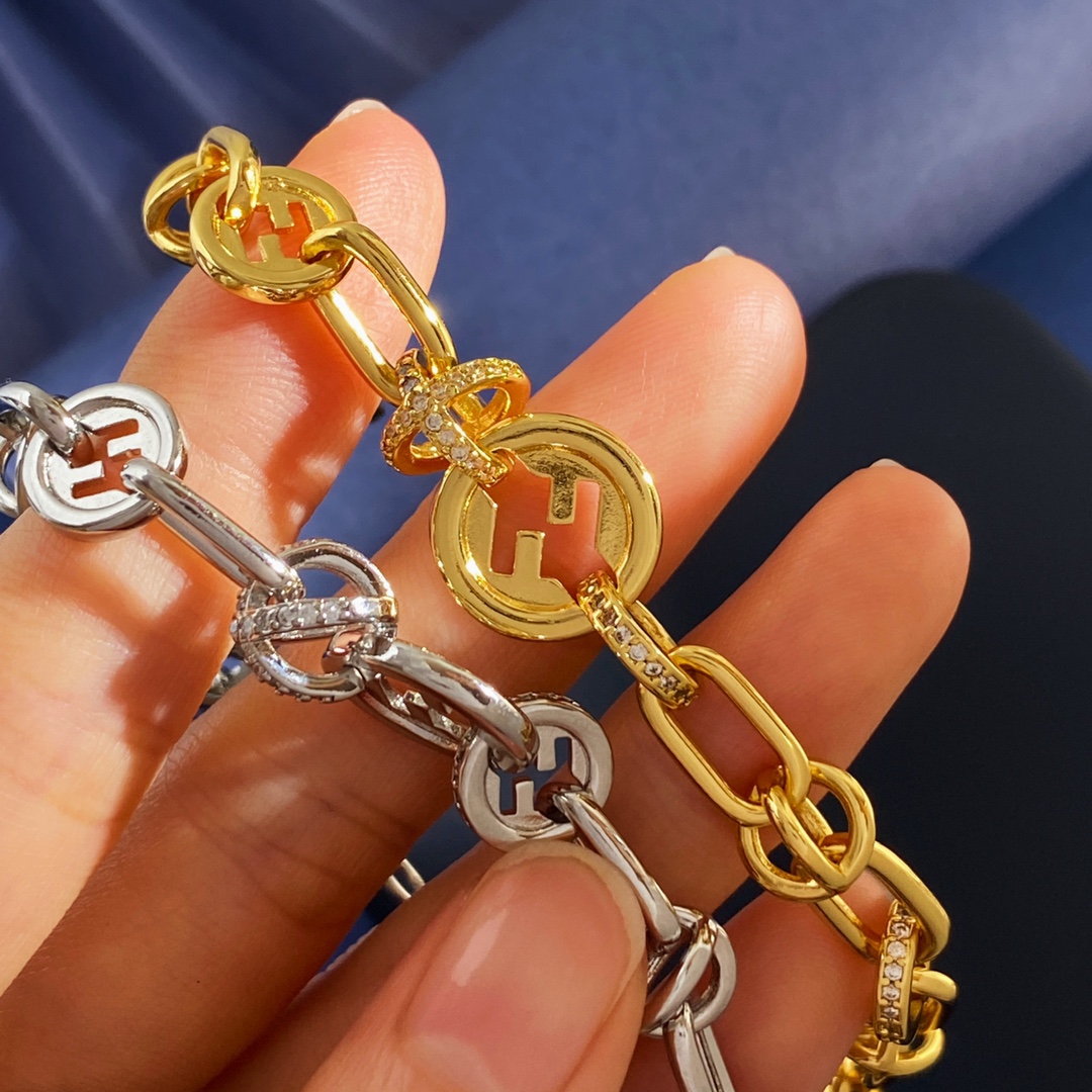 Fendi EverRound F Is Fendi bracelet gold-tone metal with clear crystal accents silver-tone metal with clear crystal accents adjustable 16-20cm