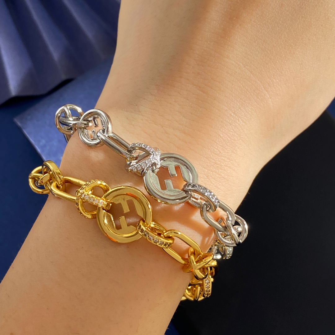 Fendi EverRound F Is Fendi bracelet gold-tone metal with clear crystal accents silver-tone metal with clear crystal accents adjustable 16-20cm