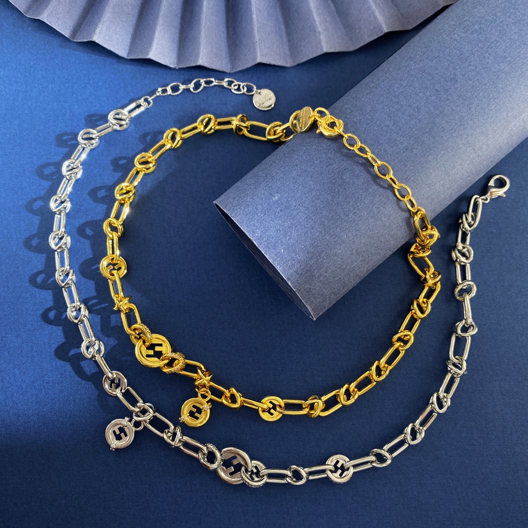 Fendi EverRound necklace Two-tone gold and silver metal with clear crystal accents and black enamel FF logo details 40cm with 5cm extender