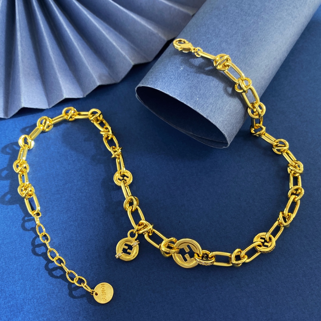 Fendi EverRound necklace Two-tone gold and silver metal with clear crystal accents and black enamel FF logo details 40cm with 5cm extender