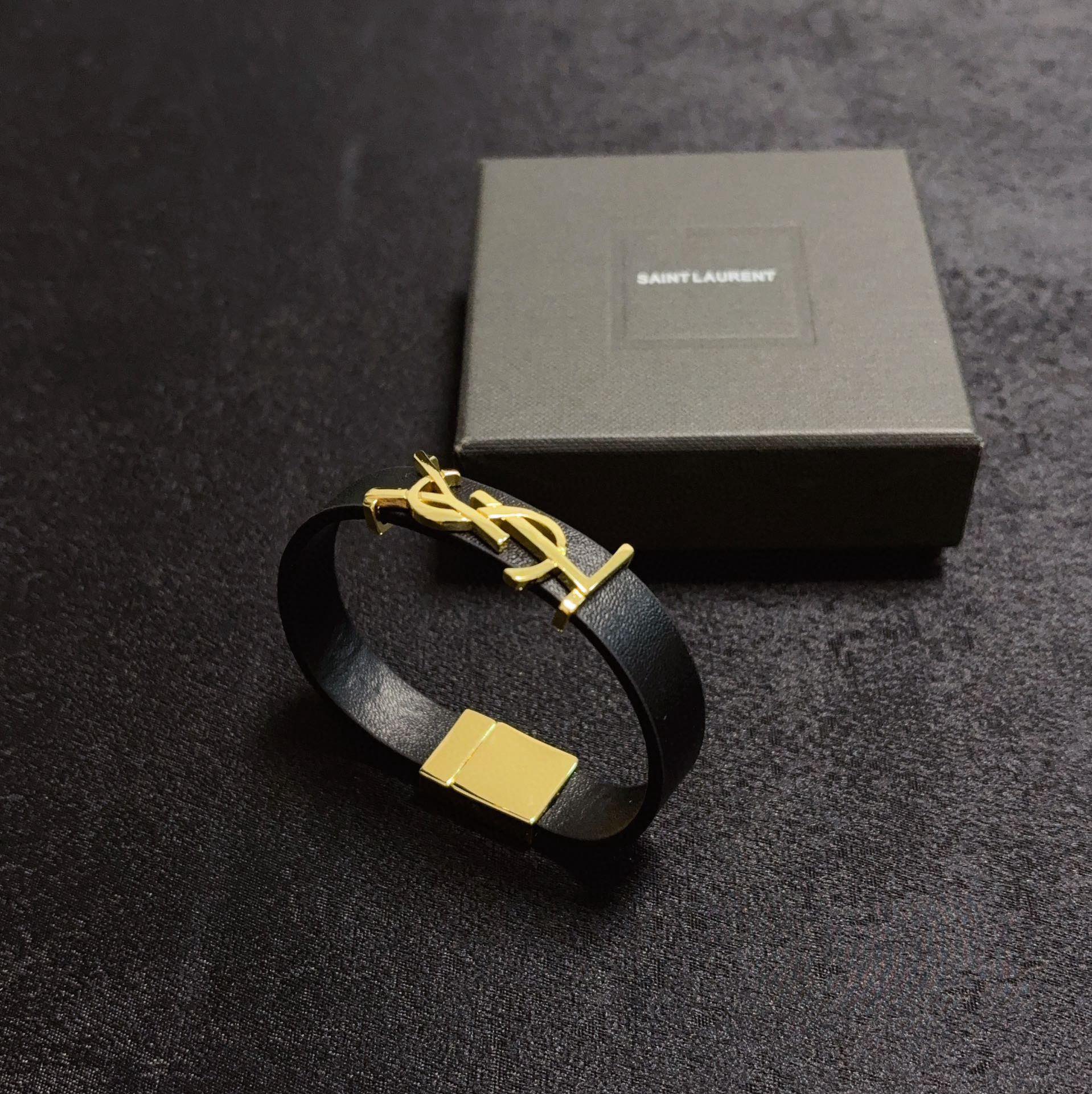 Saint Laurent Cassandre bracelet black leather gold-tone metal 17cm