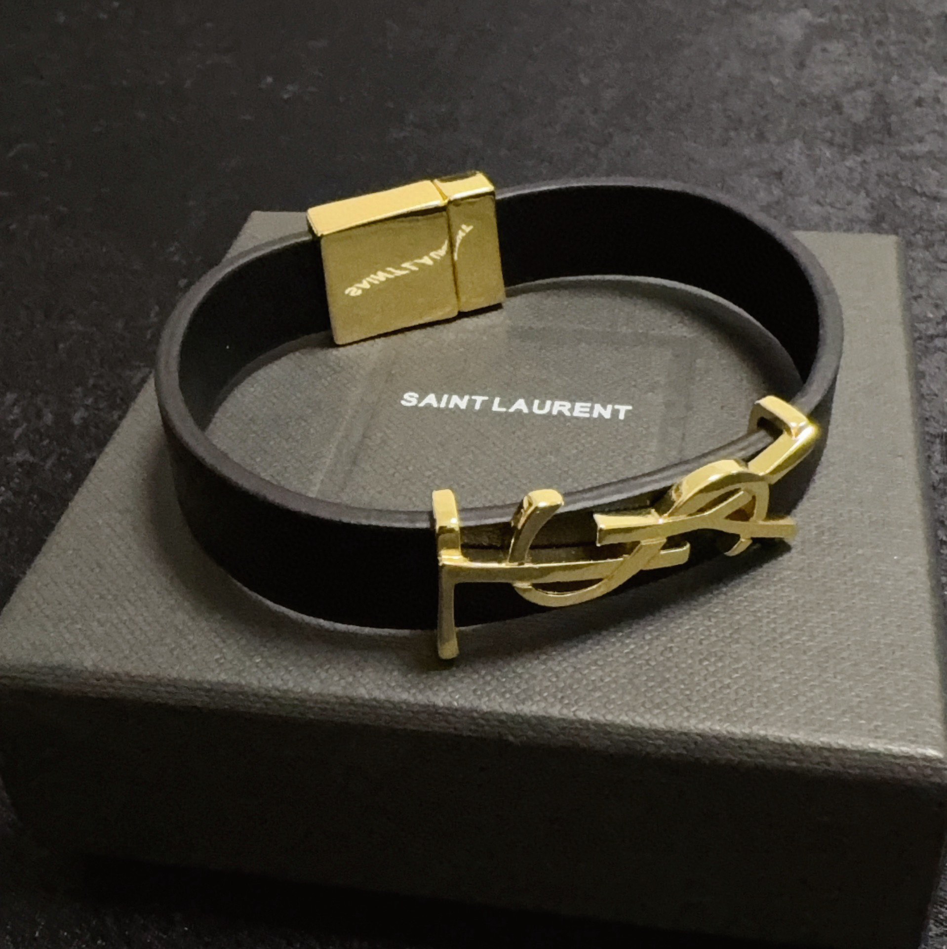 Saint Laurent Cassandre bracelet black leather gold-tone metal 17cm