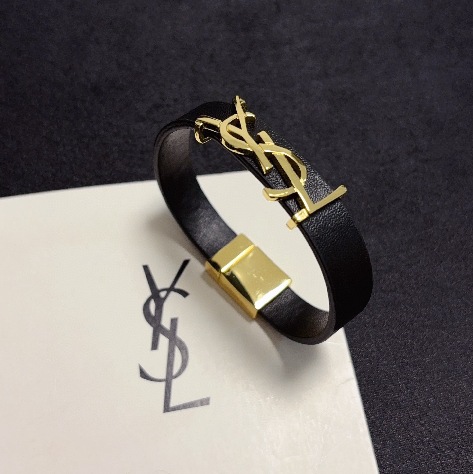 Saint Laurent Cassandre bracelet black leather gold-tone metal 17cm