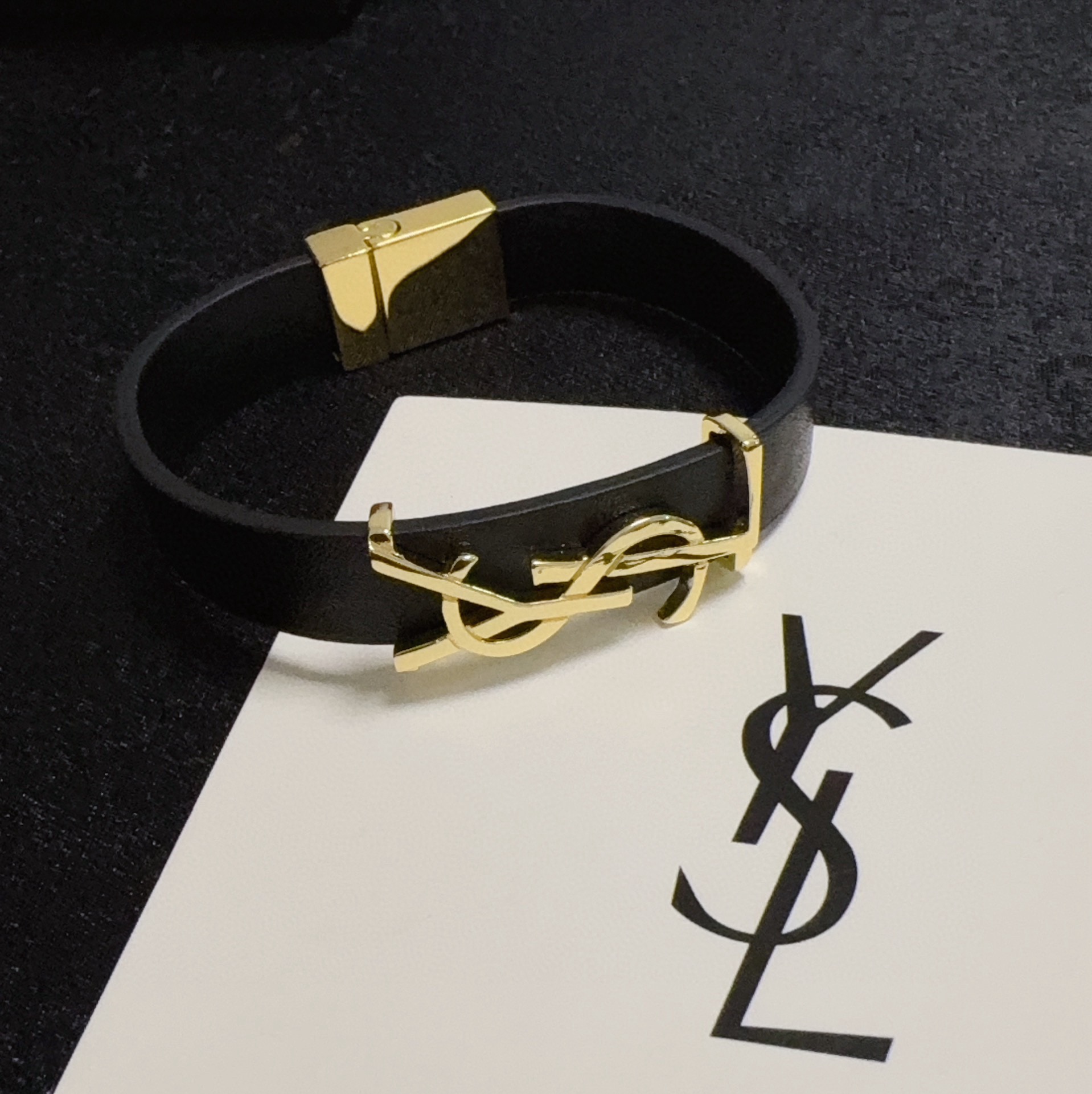 Saint Laurent Cassandre bracelet black leather gold-tone metal 17cm