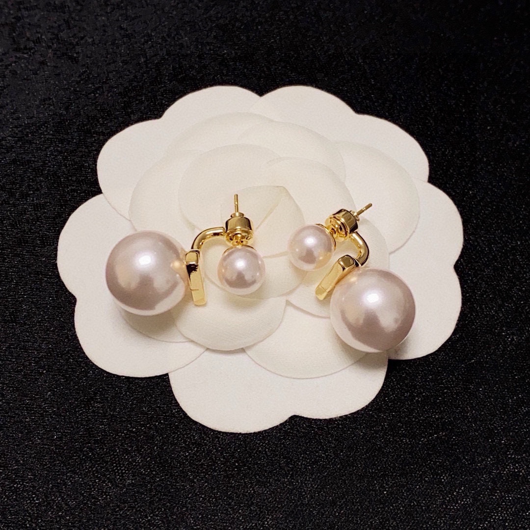 Celine Double Pearl Drop Earrings earrings Gold-tone metal with creamy white faux pearls One size large pearl approx 16mm diameter small pearl approx 8mm