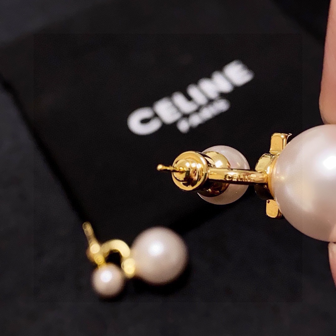 Celine Double Pearl Drop Earrings earrings Gold-tone metal with creamy white faux pearls One size large pearl approx 16mm diameter small pearl approx 8mm