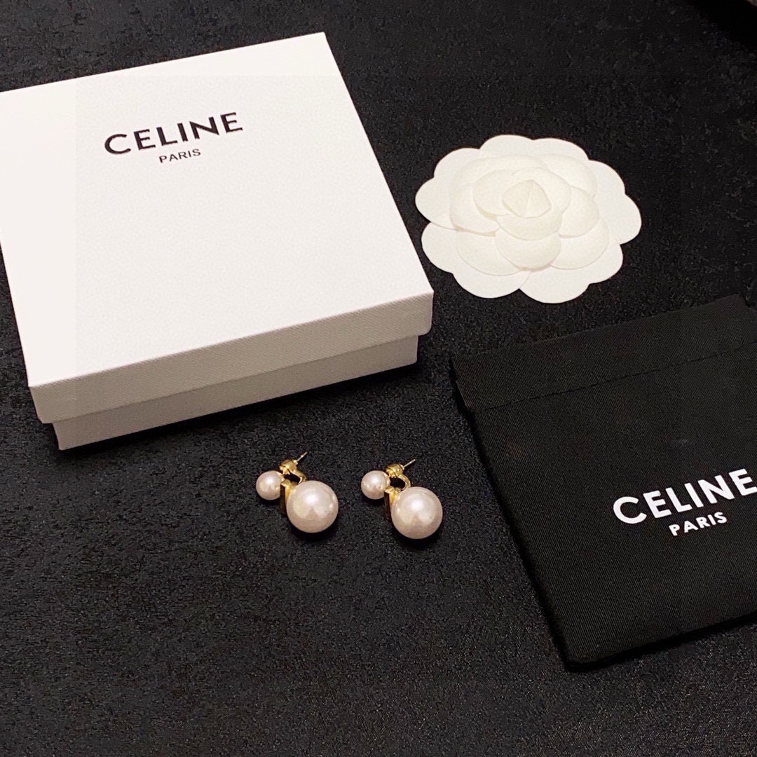 Celine Double Pearl Drop Earrings earrings Gold-tone metal with creamy white faux pearls One size large pearl approx 16mm diameter small pearl approx 8mm