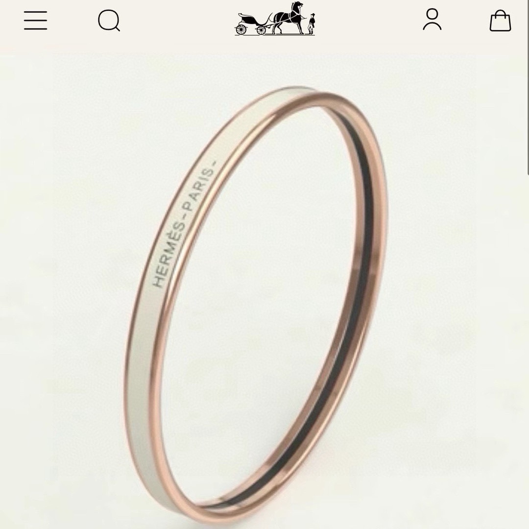 Bracciale Hermes Uni Bangle MM Metallo placcato oro rosa con smalto bianco crema e dettaglio interno nero