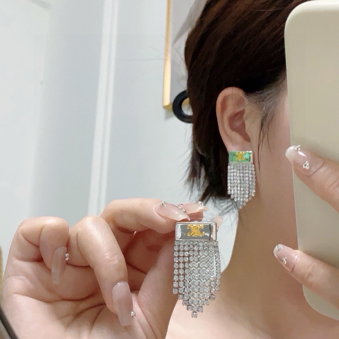 Celine Triomphe Crystal Fringe Earrings earrings silver-tone metal with gold-tone Triomphe logo clear crystal rhinestones 3 5cm drop length