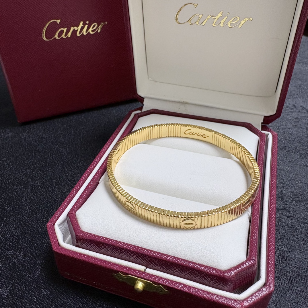 Cartier Love Ribbed Cuff bracelet 18k yellow gold and 18k white gold no gemstones 17cm inner circumference