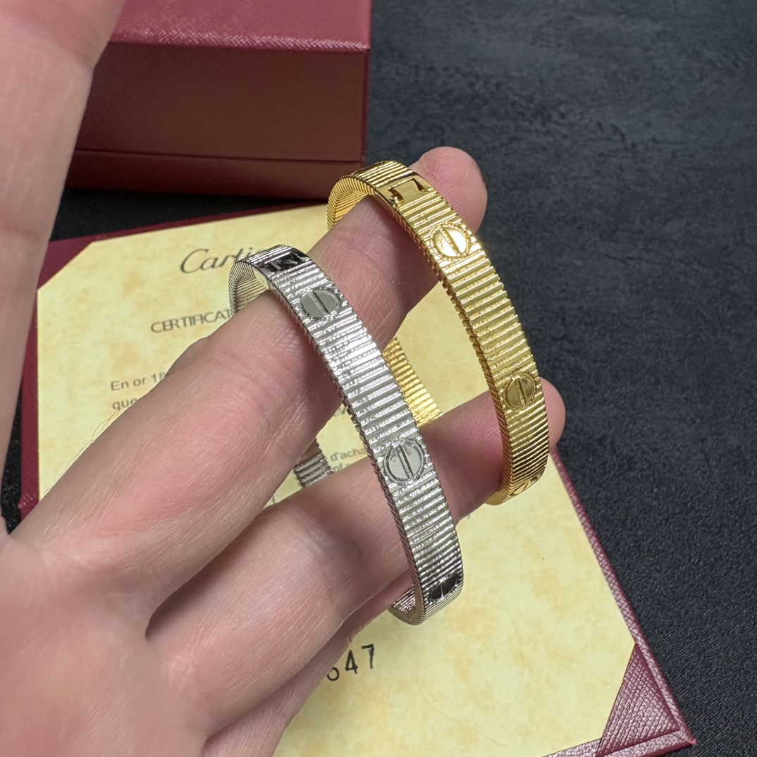 Cartier Love Ribbed Cuff bracelet 18k yellow gold and 18k white gold no gemstones 17cm inner circumference