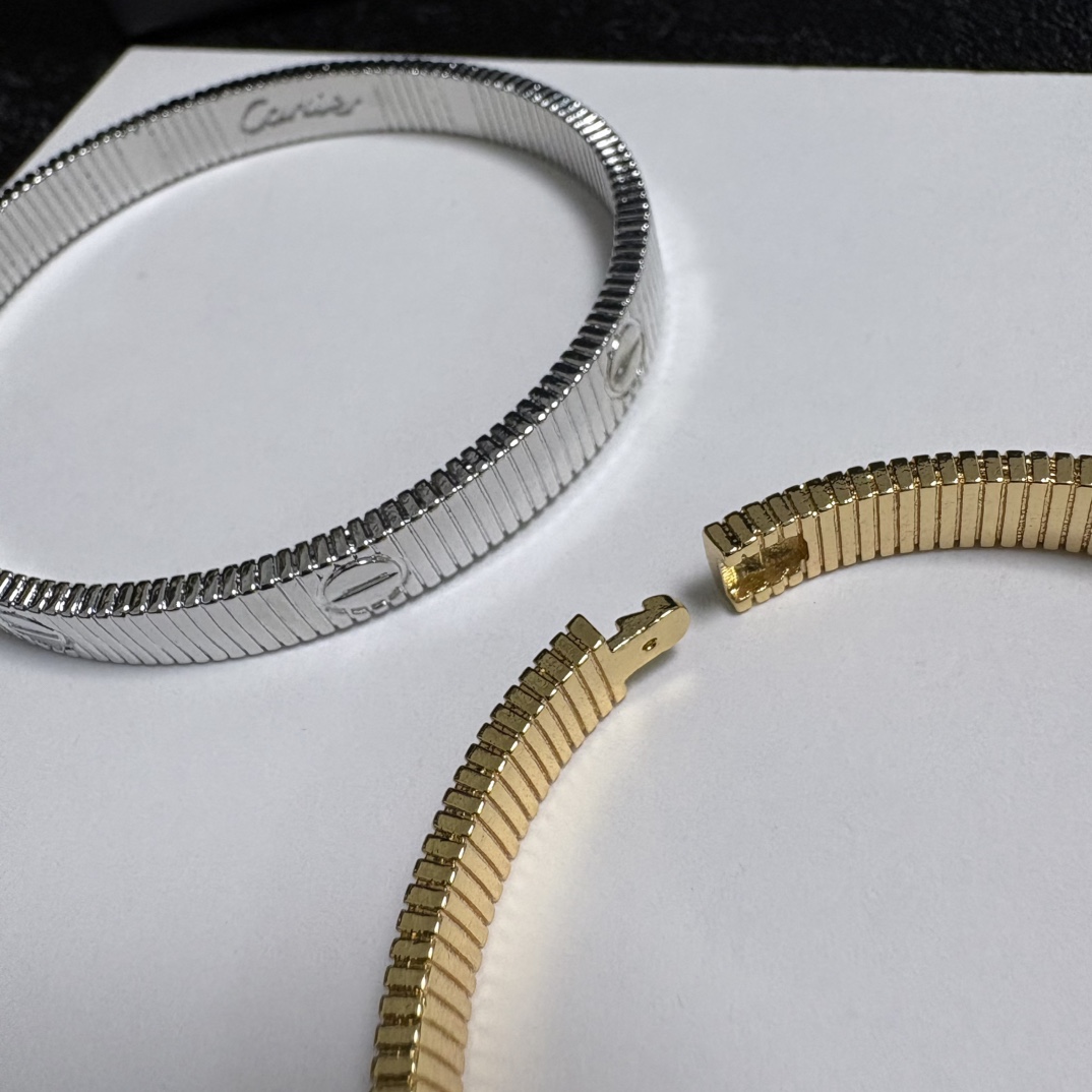 Cartier Love Ribbed Cuff bracelet 18k yellow gold and 18k white gold no gemstones 17cm inner circumference