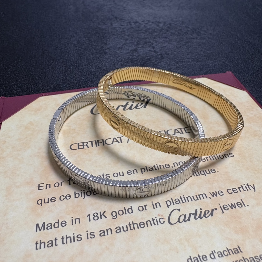 Cartier Love Ribbed Cuff bracelet 18k yellow gold and 18k white gold no gemstones 17cm inner circumference