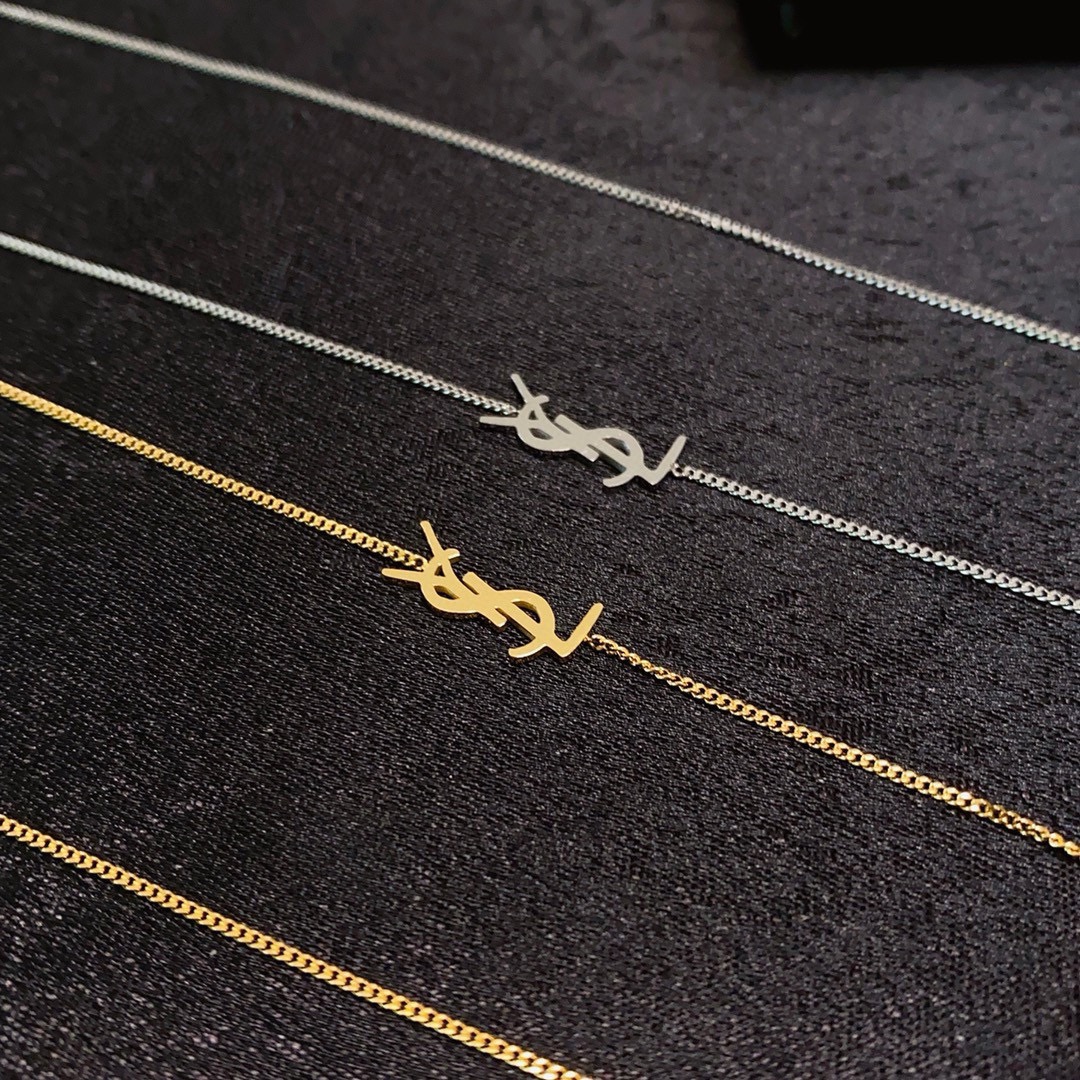 Saint Laurent Cassandre Logo Pendant necklace Gold-tone metal no gemstones 40cm