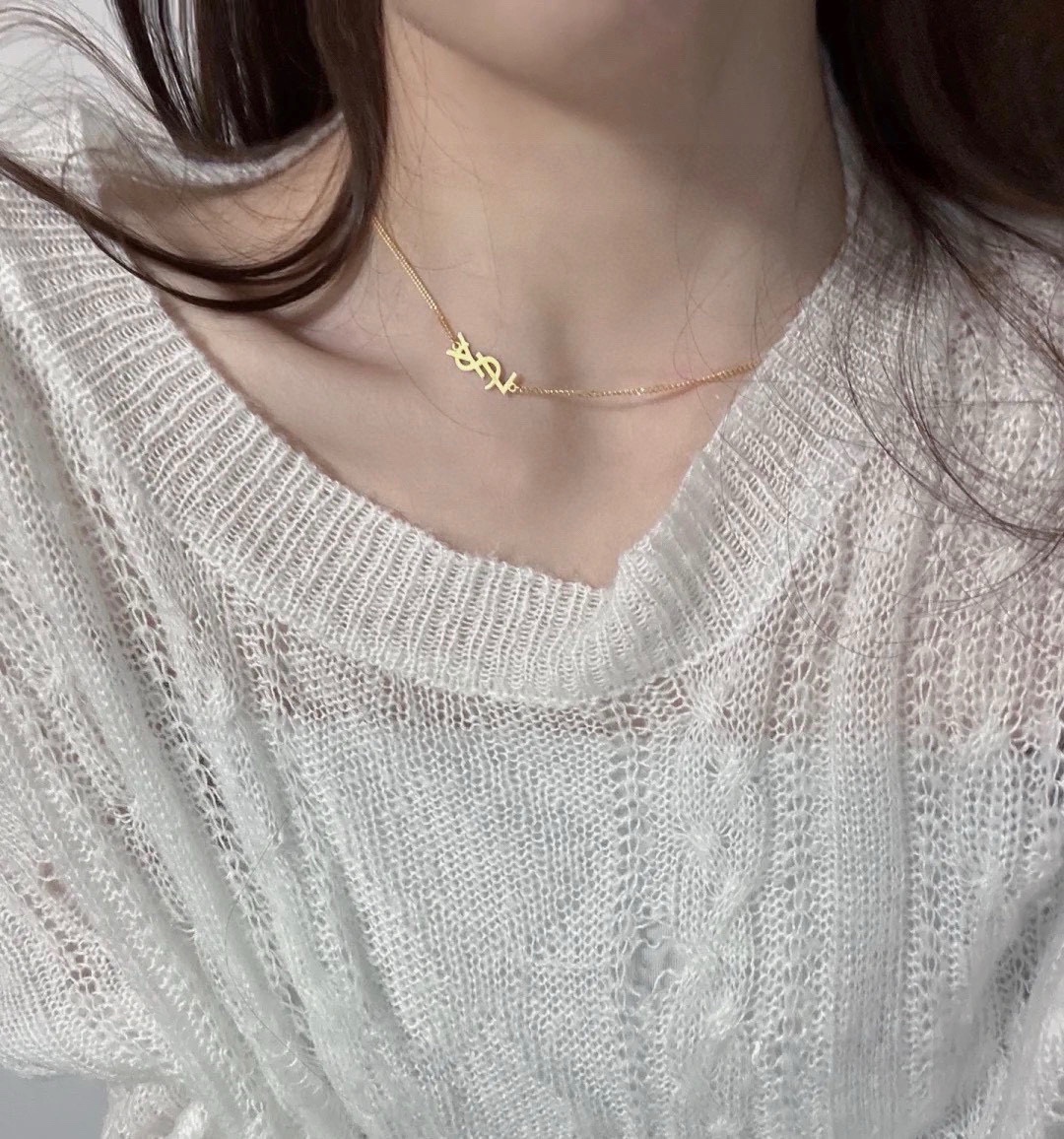 Saint Laurent Cassandre Logo Pendant necklace Gold-tone metal no gemstones 40cm