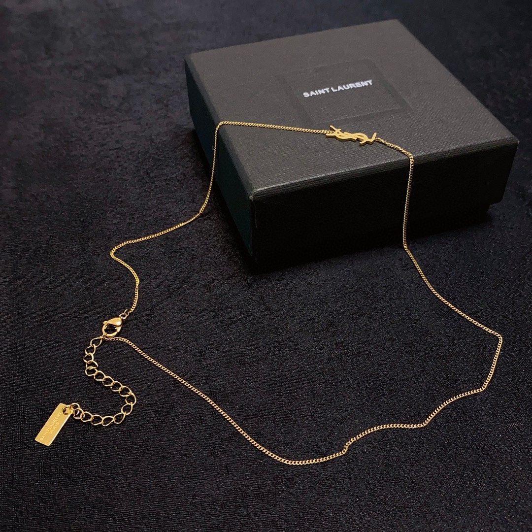 Saint Laurent Cassandre Logo Pendant necklace Gold-tone metal no gemstones 40cm