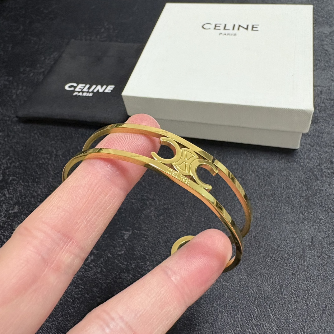 Celine Triomphe Open Cuff bracelet gold-tone metal no accent stones adjustable open cuff fits 15-18cm wrist circumference