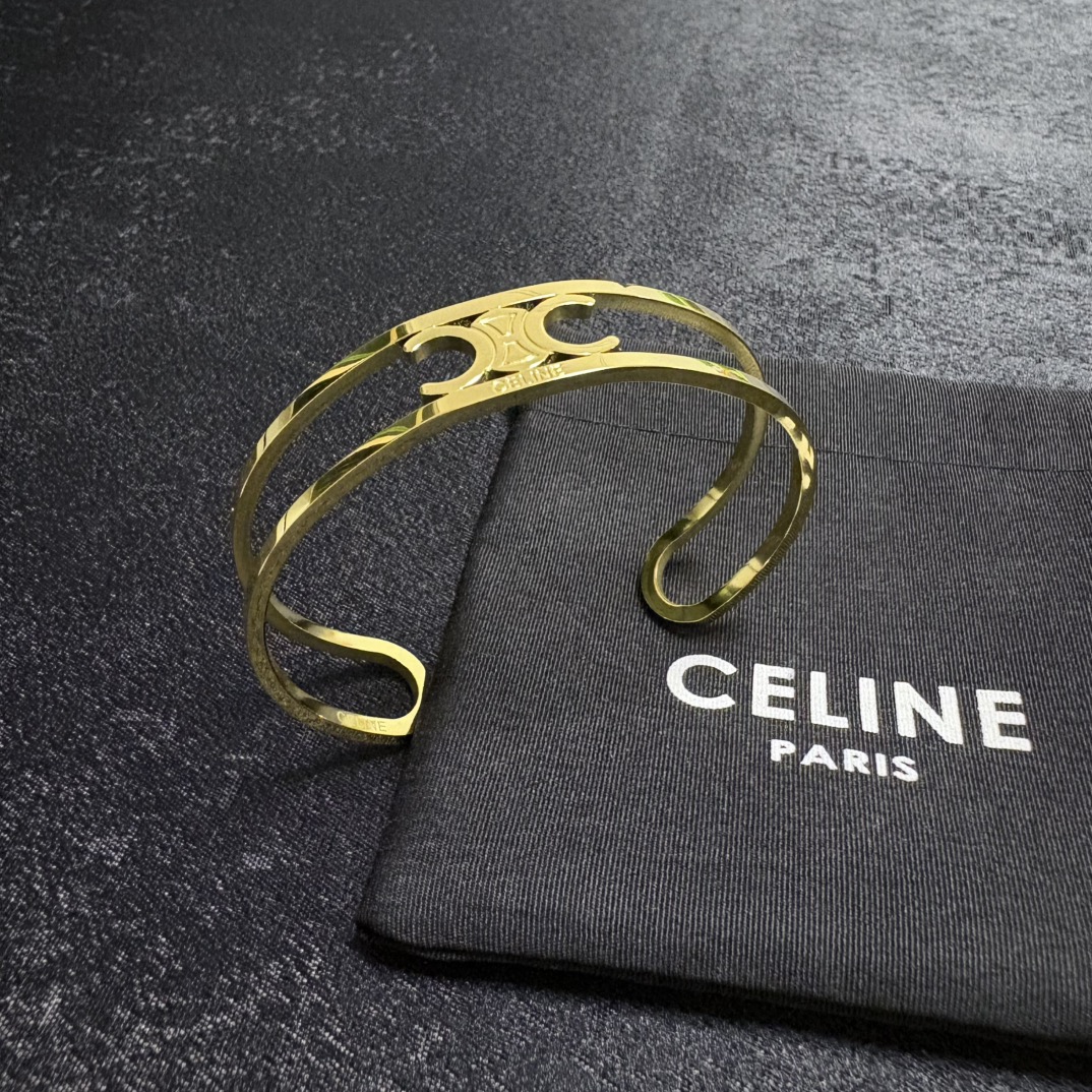 Celine Triomphe Open Cuff bracelet gold-tone metal no accent stones adjustable open cuff fits 15-18cm wrist circumference