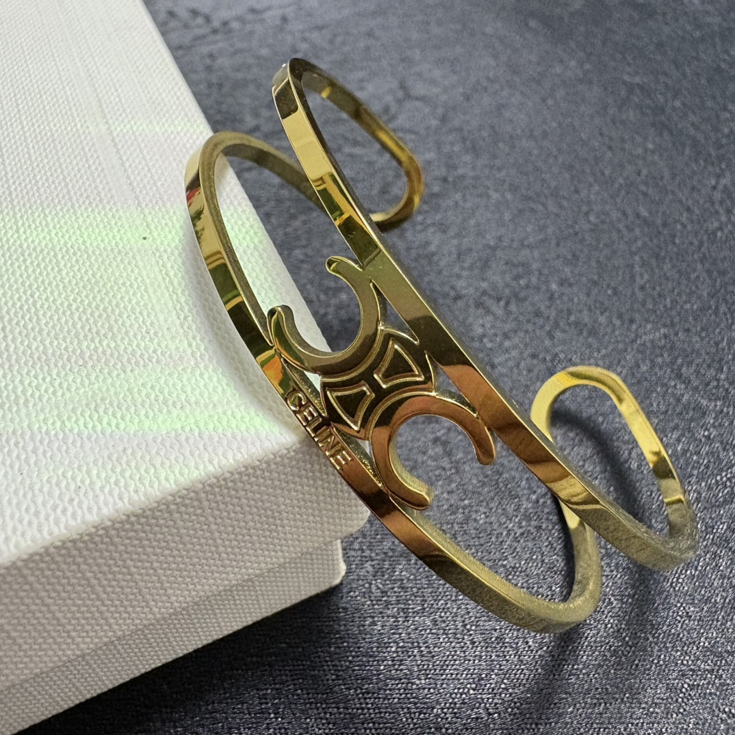 Celine Triomphe Open Cuff bracelet gold-tone metal no accent stones adjustable open cuff fits 15-18cm wrist circumference