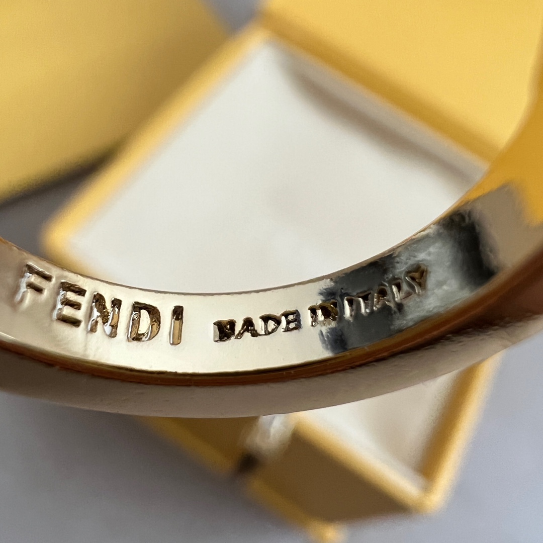Fendi FF Logo Enamel Bangle Hoop Earrings Set bracelet earrings Gold-tone metal with white and black enamel accents One size bangle inner diameter 6cm hoop earring diameter 1 5cm