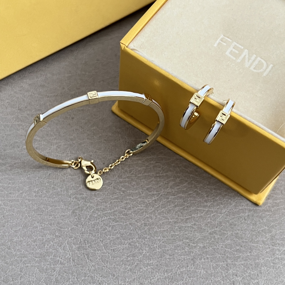Fendi FF Logo Enamel Bangle bracelet Gold-tone metal with white black enamel accents 17cm