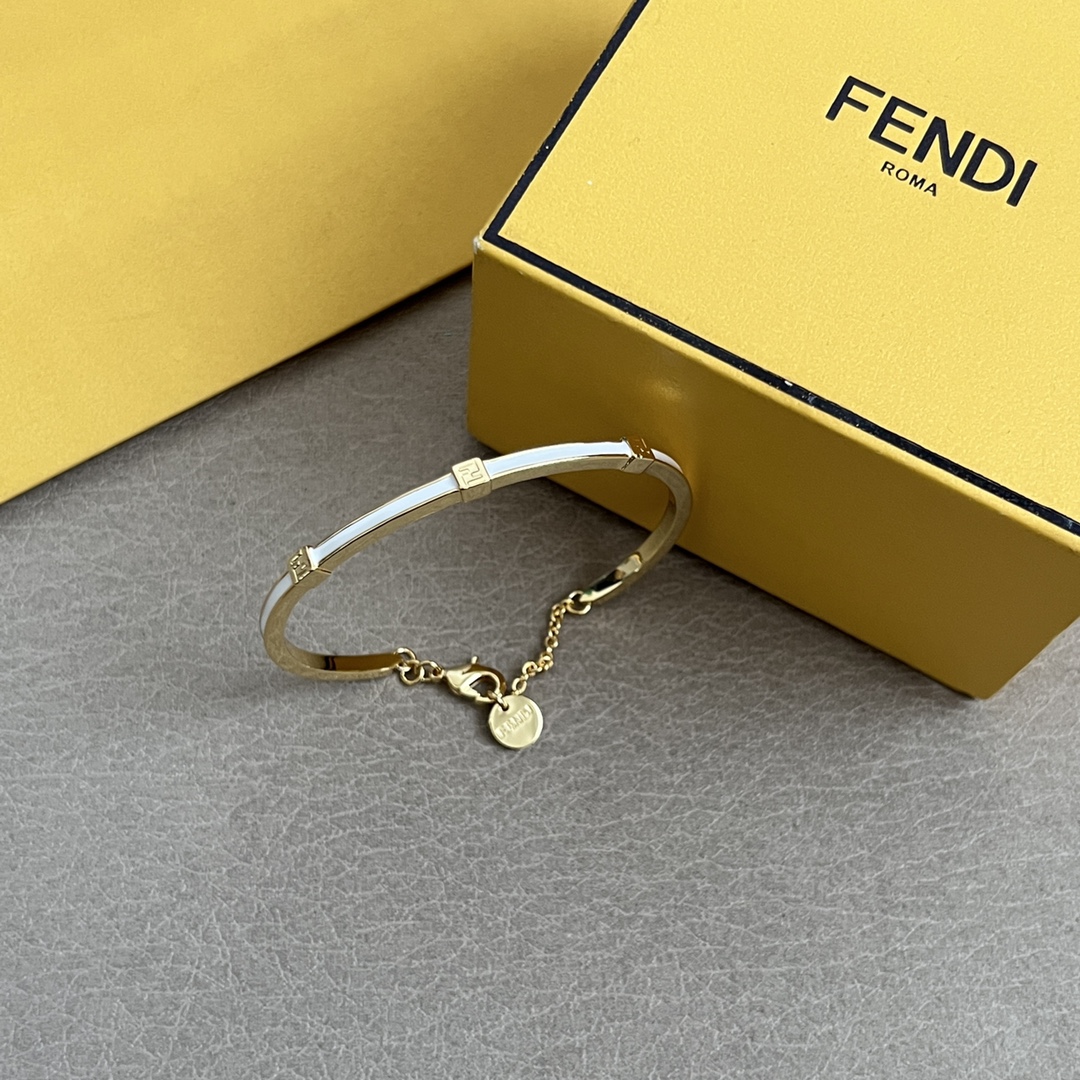 Fendi FF Logo Enamel Bangle bracelet Gold-tone metal with white black enamel accents 17cm