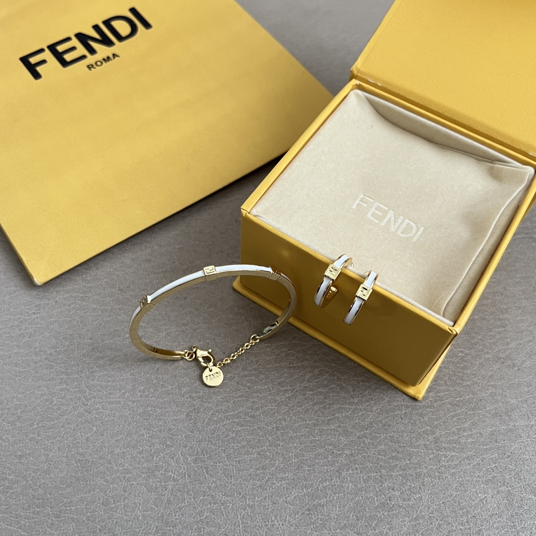 Fendi FF Logo Enamel Bangle bracelet Gold-tone metal with white black enamel accents 17cm