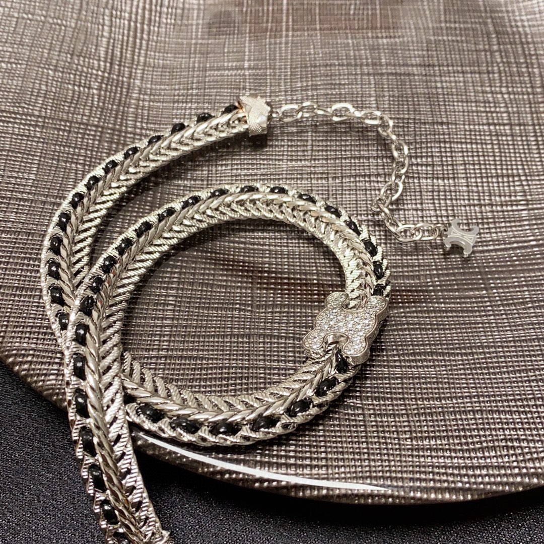 Celine Skeleton Chic Triomphe Choker necklace silver-toned metal with black woven inlay and clear crystal pave Triomphe logo 35cm with 5cm extender