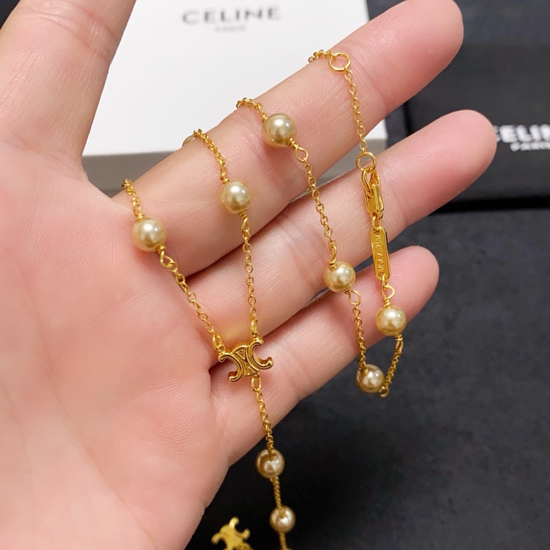 Celine Triomphe Pearl Lariat necklace gold-tone metal with cream pearls 80cm