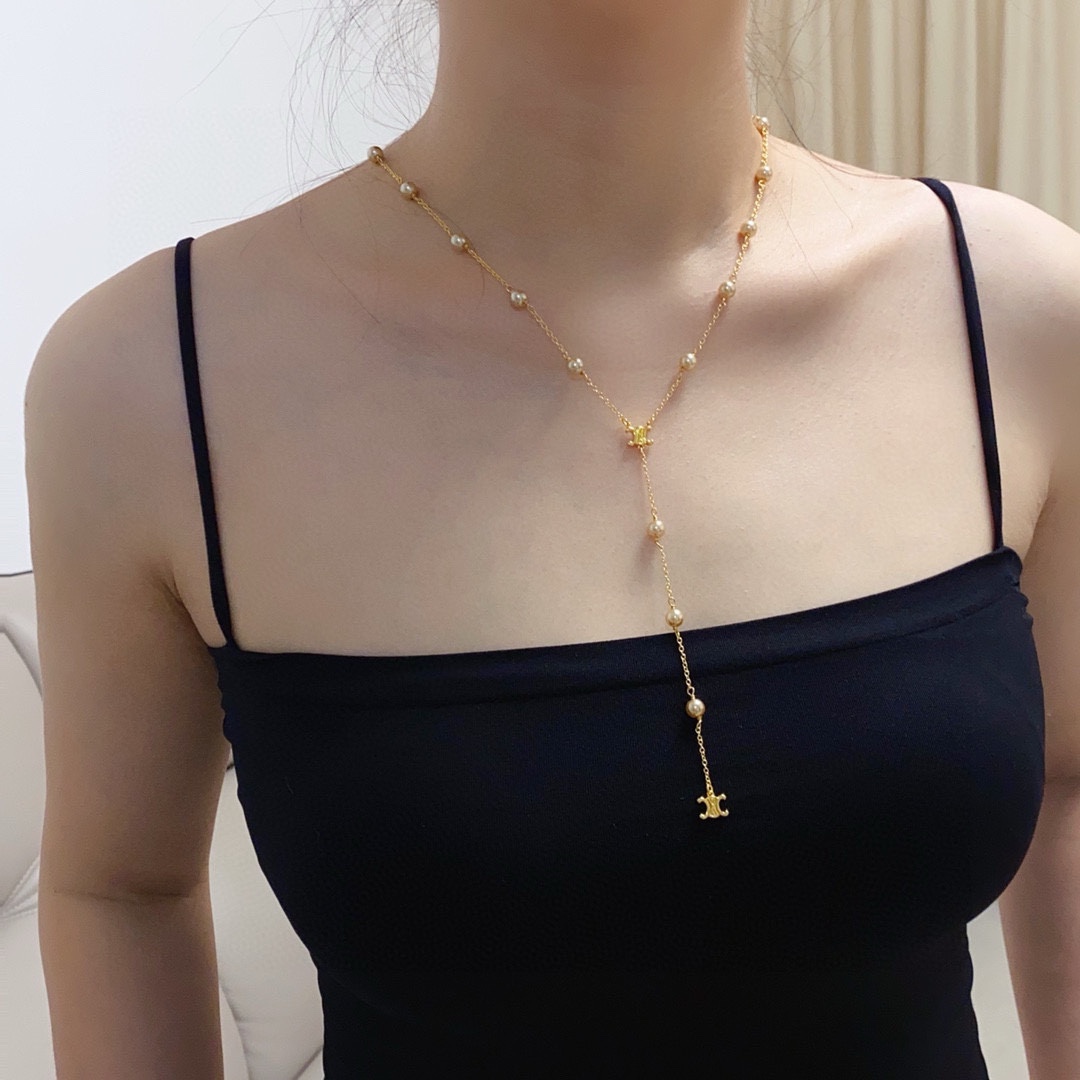 Celine Triomphe Pearl Lariat necklace gold-tone metal with cream pearls 80cm