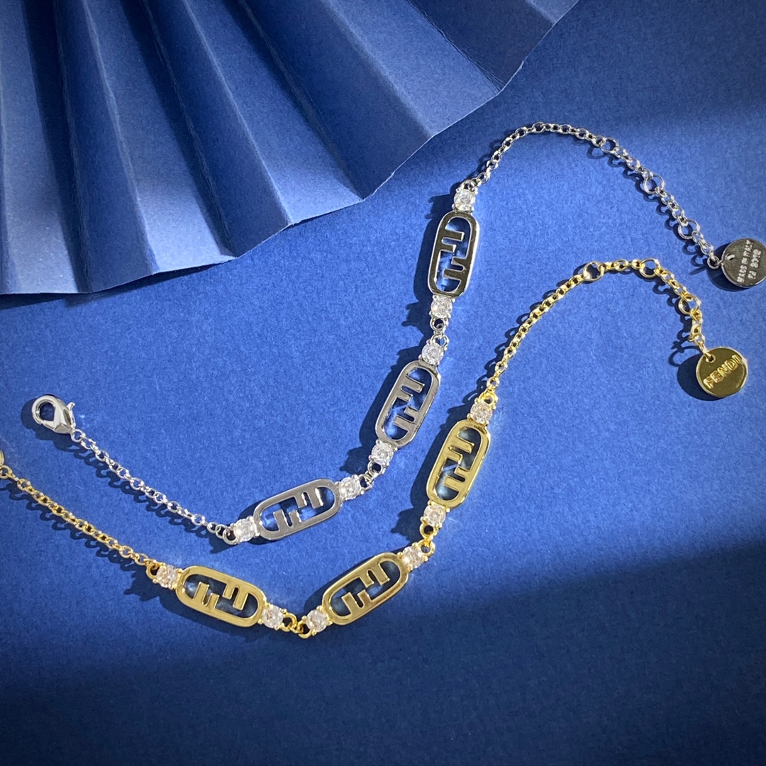 Fendi O Lock bracelet Gold-tone metal with clear faceted stones also available in silver-tone metal with clear faceted stones Adjustable with extension chain fits 16-19cm wrist