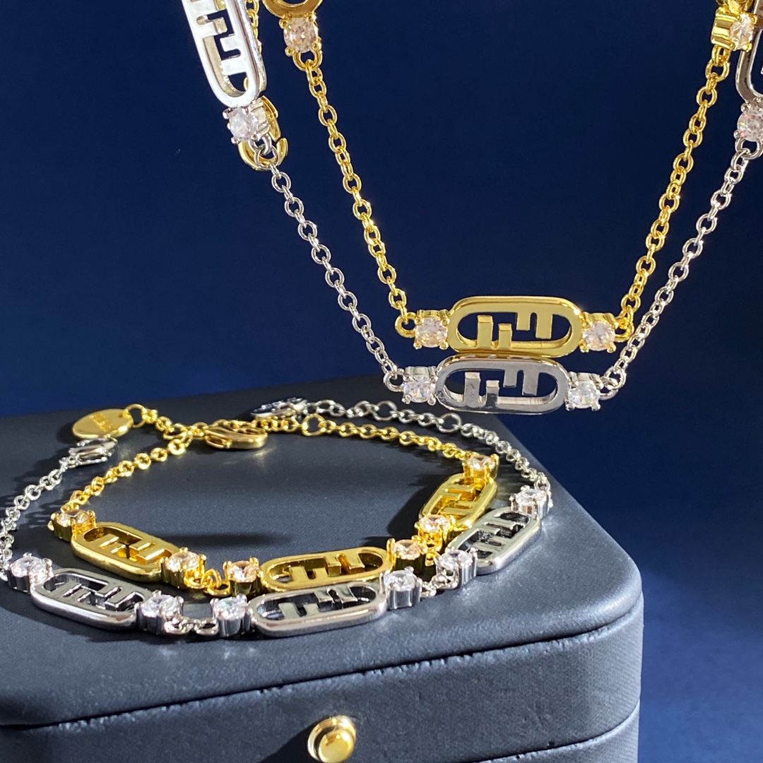 Fendi O Lock bracelet Gold-tone metal with clear faceted stones also available in silver-tone metal with clear faceted stones Adjustable with extension chain fits 16-19cm wrist