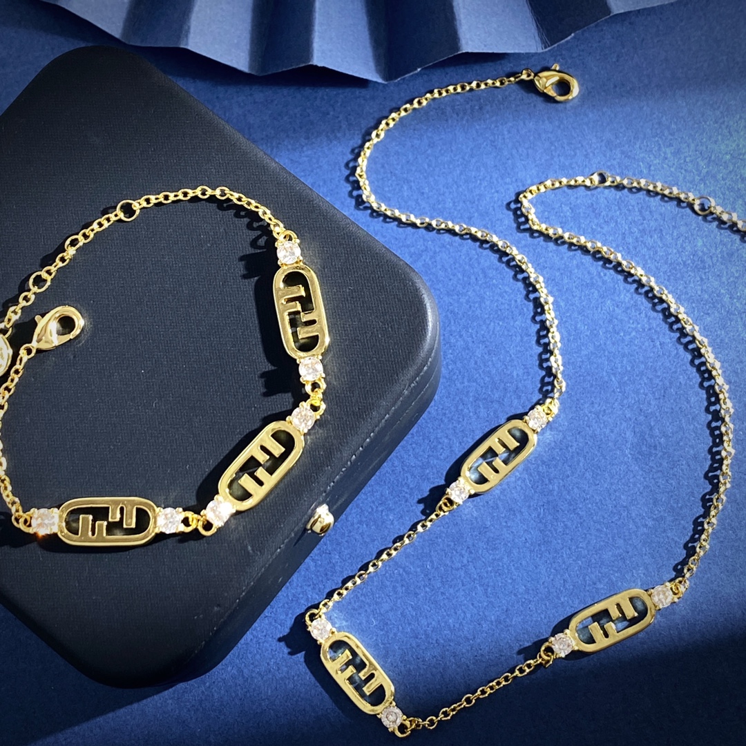 Fendi O Lock bracelet Gold-tone metal with clear faceted stones also available in silver-tone metal with clear faceted stones Adjustable with extension chain fits 16-19cm wrist