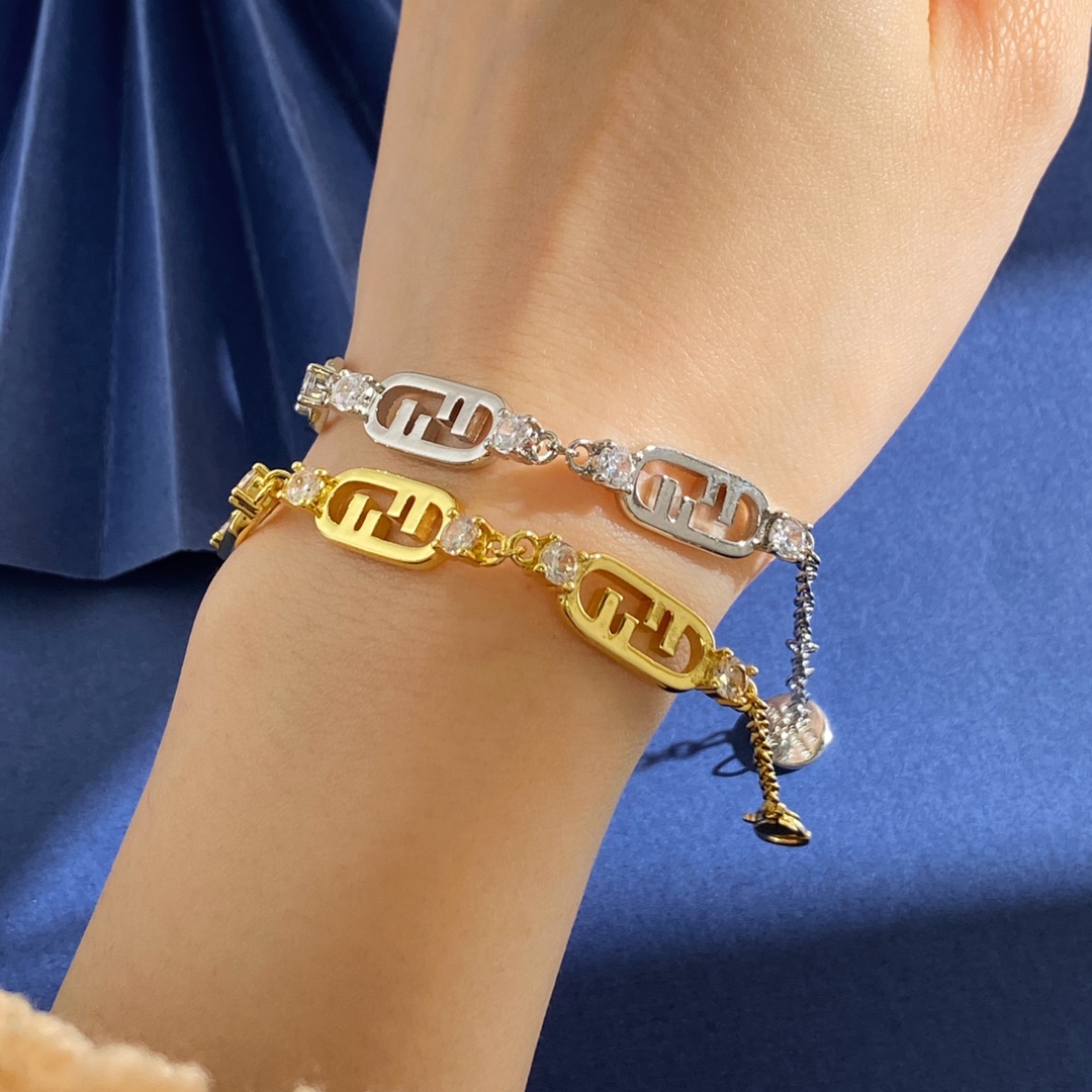 Fendi O Lock bracelet Gold-tone metal with clear faceted stones also available in silver-tone metal with clear faceted stones Adjustable with extension chain fits 16-19cm wrist