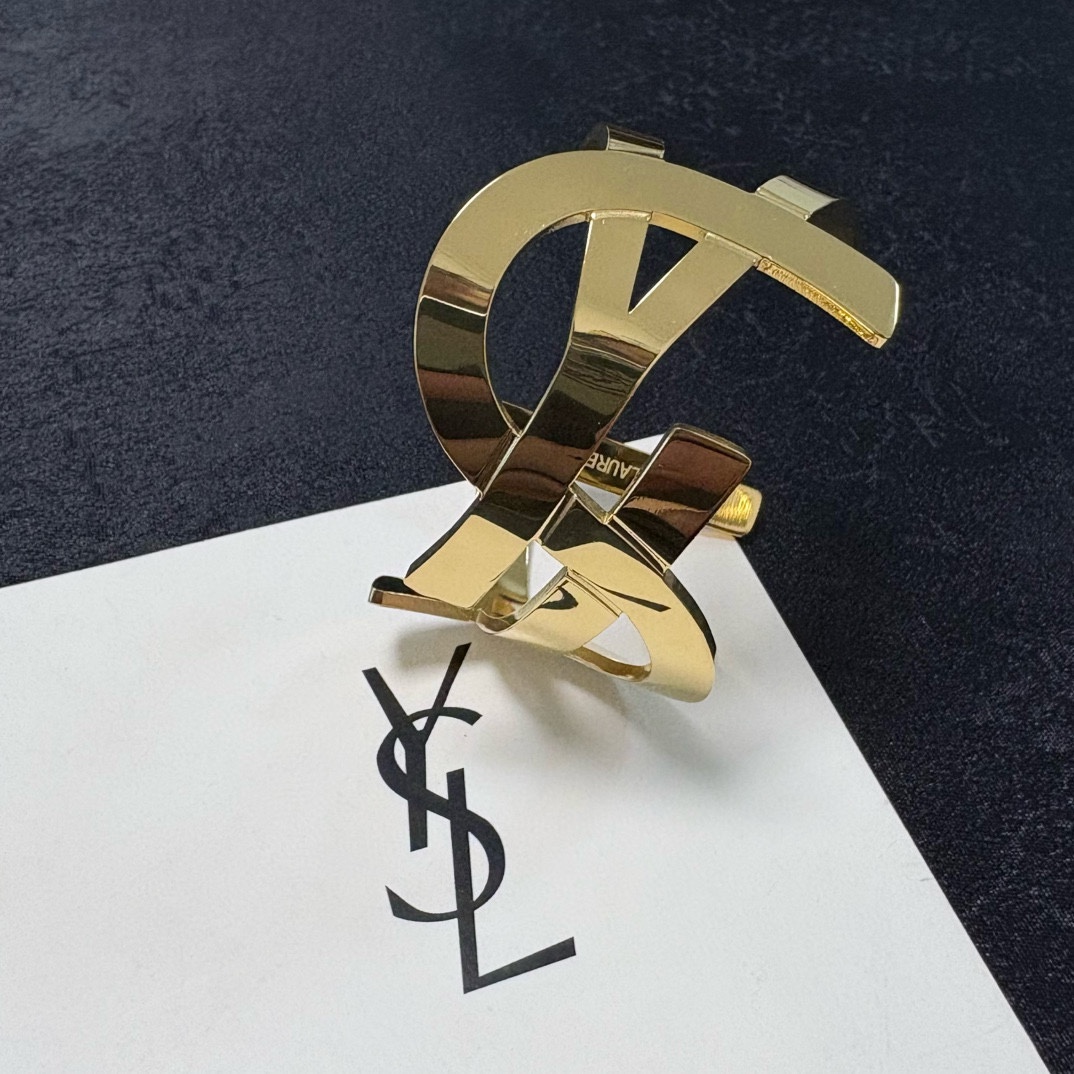 Saint Laurent YSL Monogram Skeleton Cuff bracelet polished gold-tone metal polished silver-tone metal 6 5 inch inner circumference