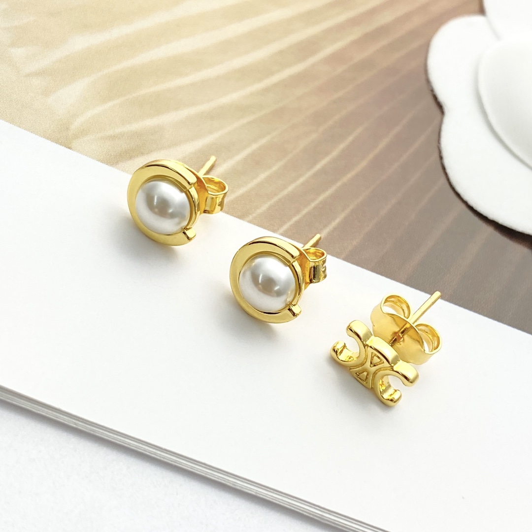 Celine Triomphe Pearl Stud Earrings earrings Gold-tone metal with white pearl accents One Size standard stud post length