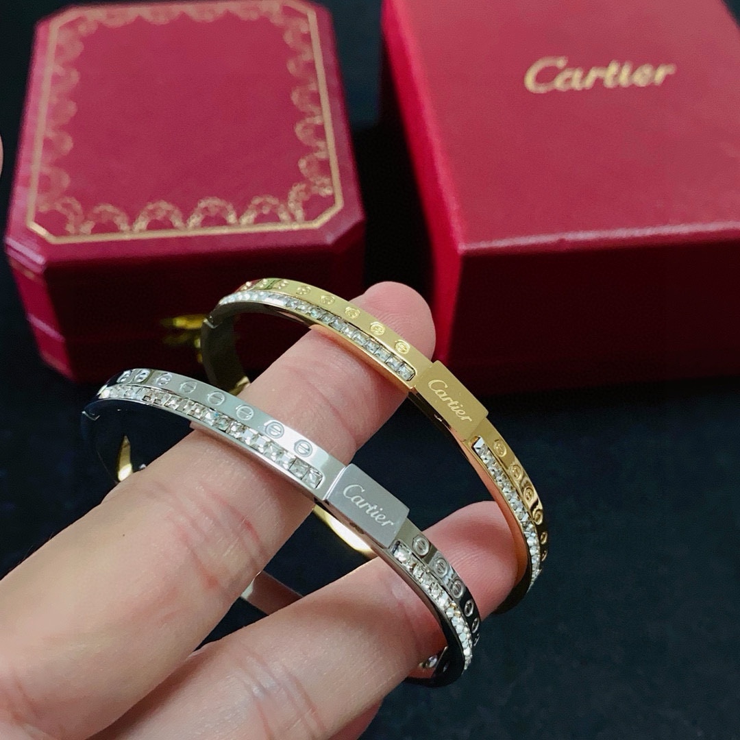 Cartier Love bracelet Yellow gold with clear diamond accents 17