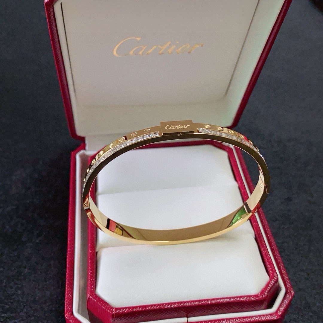 Cartier Love bracelet Yellow gold with clear diamond accents 17