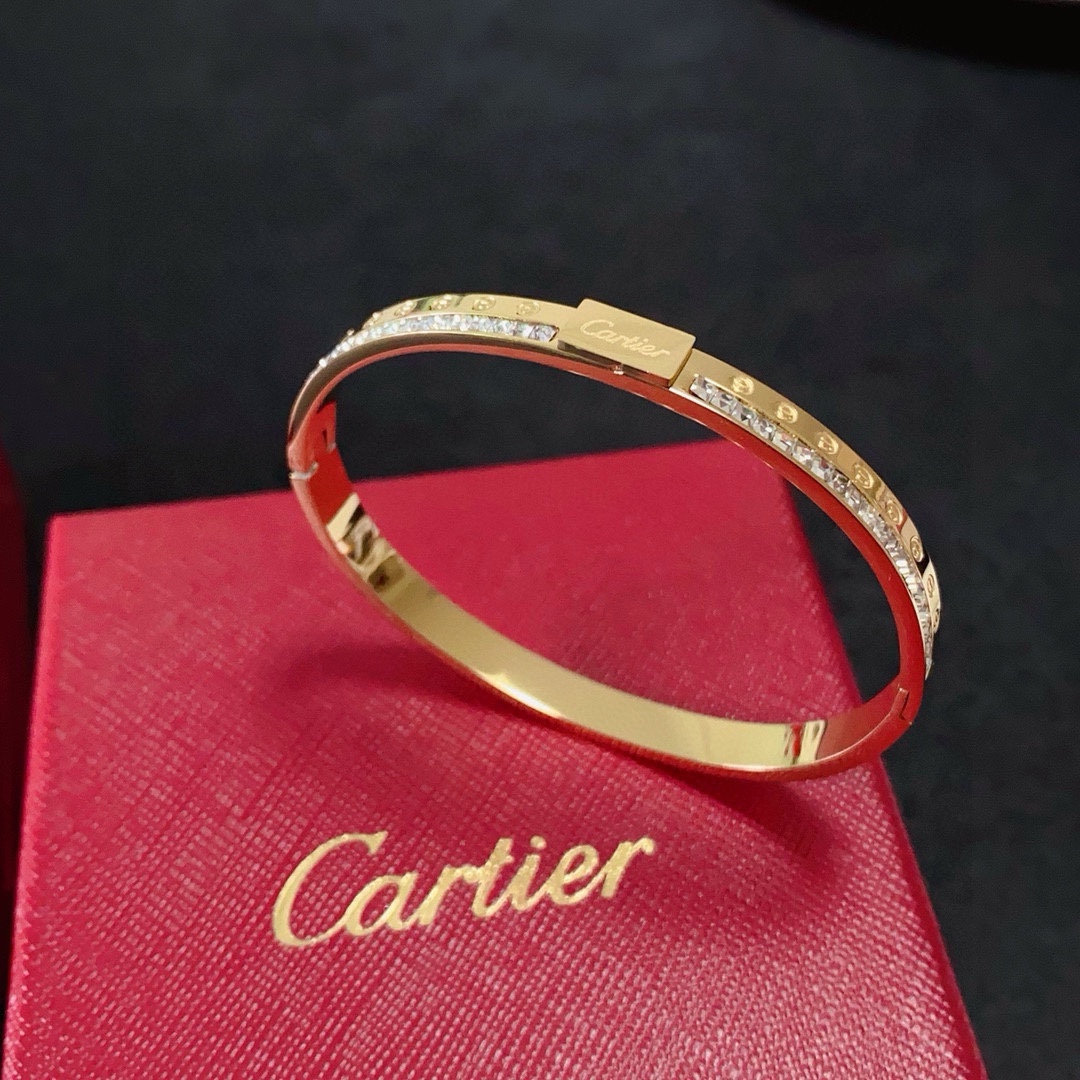 Cartier Love bracelet Yellow gold with clear diamond accents 17
