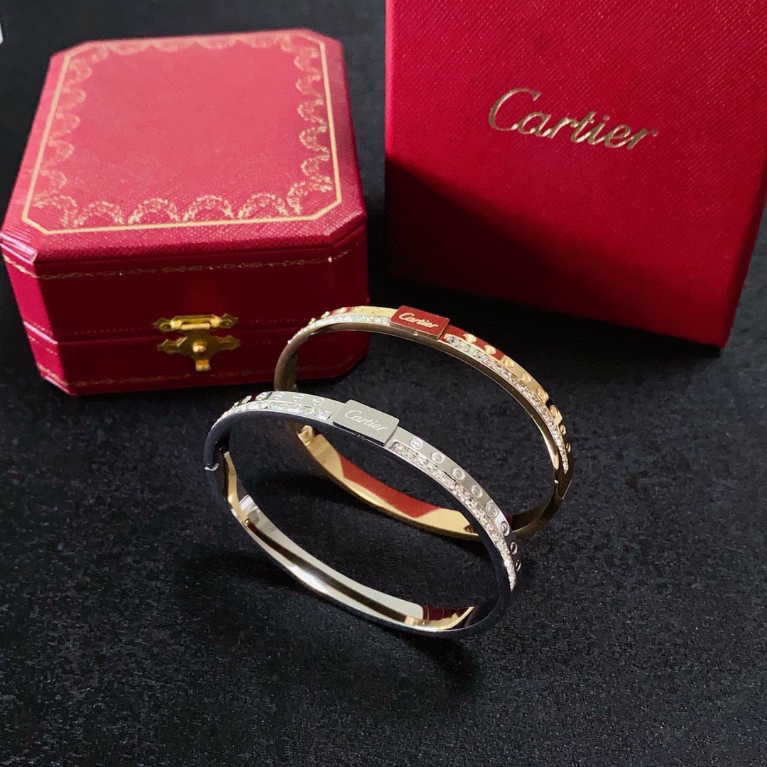 Cartier Love bracelet Yellow gold with clear diamond accents 17