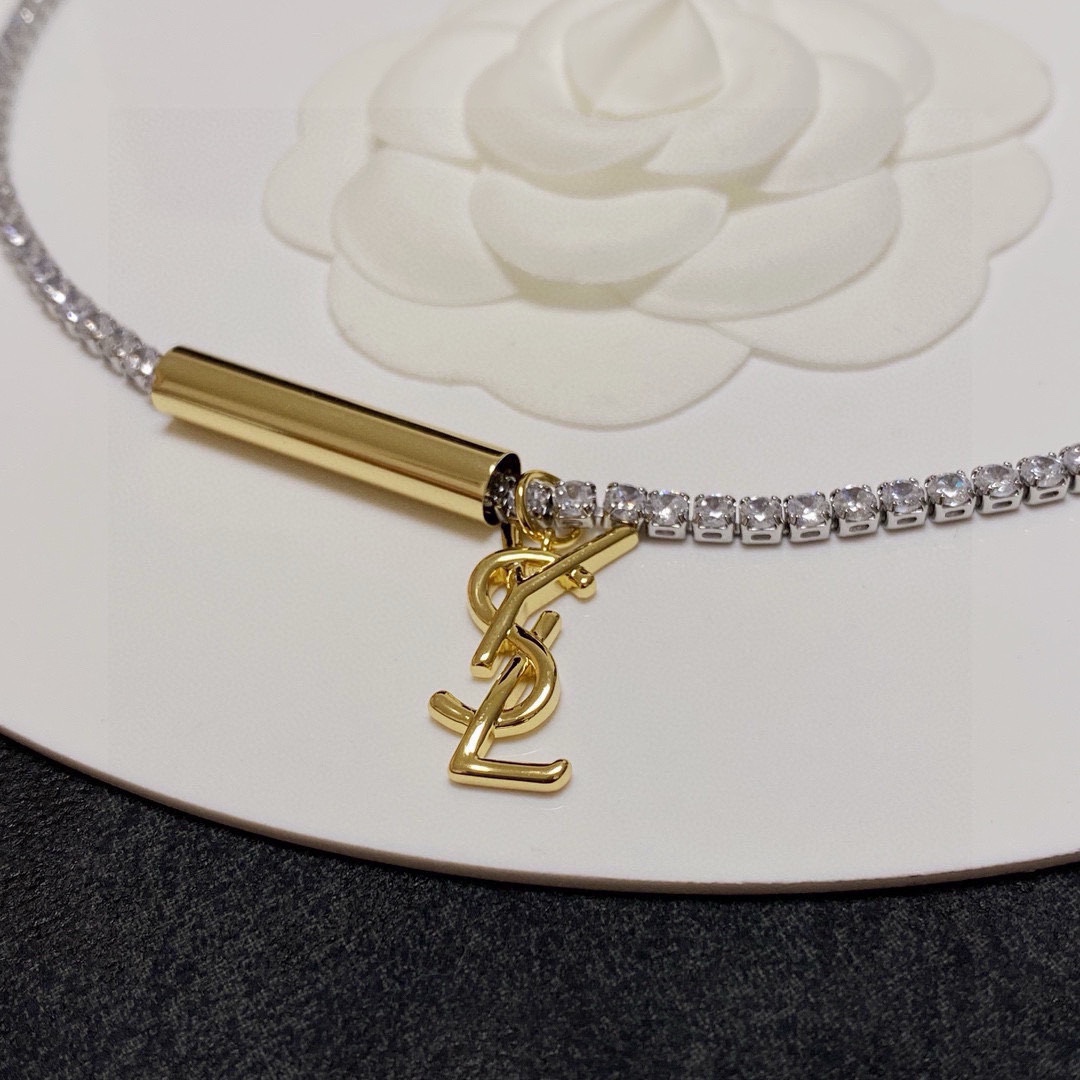 Saint Laurent Cassandre YSL Monogram Crystal Tennis Choker necklace silver-toned metal with clear faceted crystals gold-toned metal logo and bar accent 40cm with 5cm extender