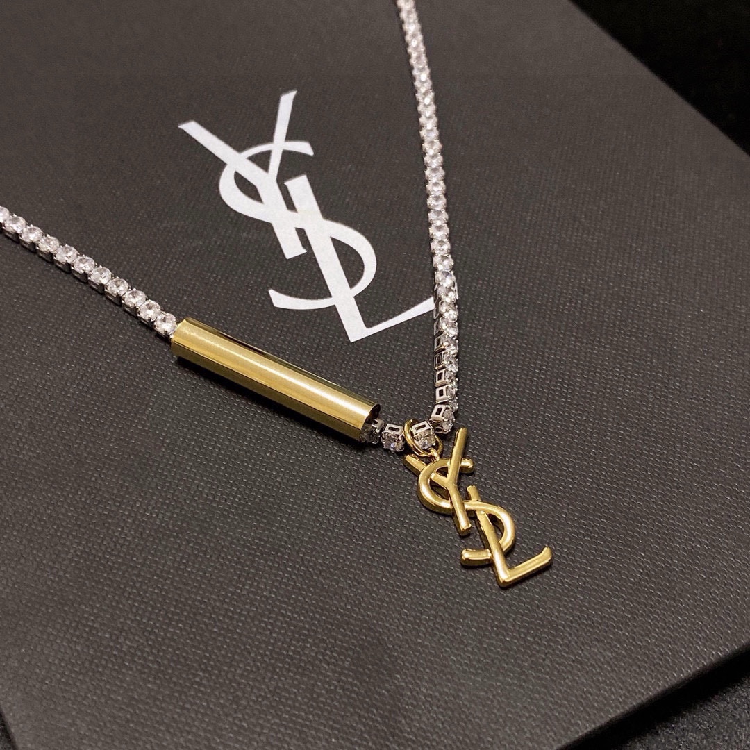 Saint Laurent Cassandre YSL Monogram Crystal Tennis Choker necklace silver-toned metal with clear faceted crystals gold-toned metal logo and bar accent 40cm with 5cm extender