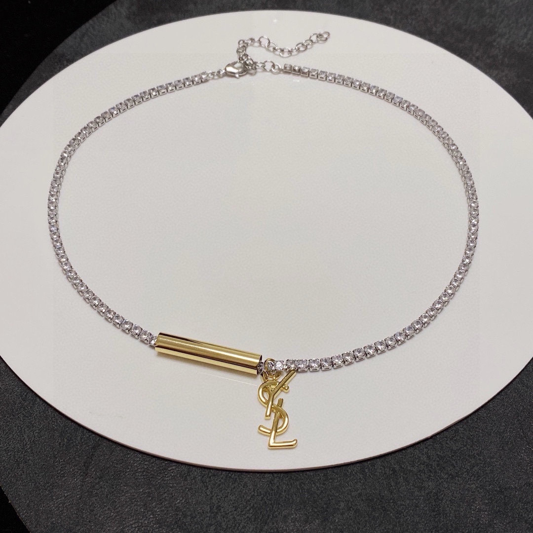 Saint Laurent Cassandre YSL Monogram Crystal Tennis Choker necklace silver-toned metal with clear faceted crystals gold-toned metal logo and bar accent 40cm with 5cm extender